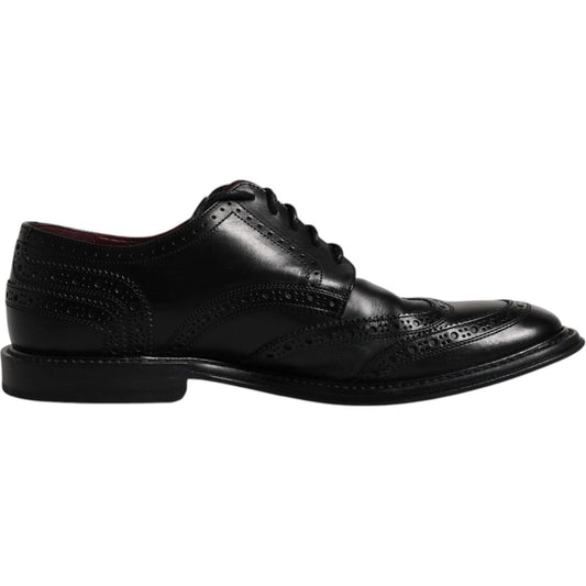 Dolce & Gabbana black leather derby wingtip formal shoes, calfskin, lace-up, logo detail, preowned with tags, missing logo on one shoe.