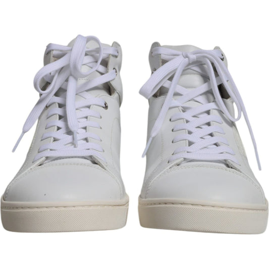 Dolce & Gabbana white leather mid-top men's sneakers with rubber sole and lace-up closure, featuring logo details, made in Italy.