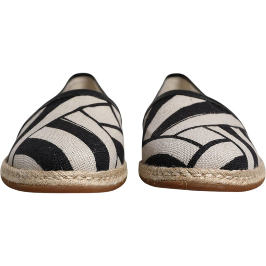 Dolce & Gabbana black and white striped slip-on espadrille shoes, linen and leather, front view showing exclusive craftsmanship.