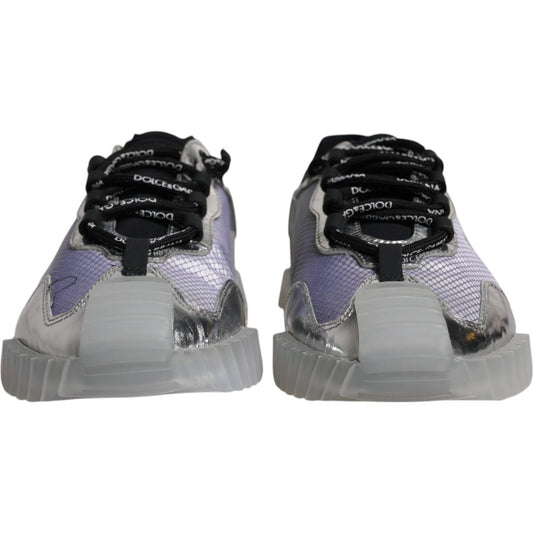 Front view of Dolce & Gabbana NS1 sneakers in silver and black, showing lace-up design and logo details, minor defect visible on left shoe.