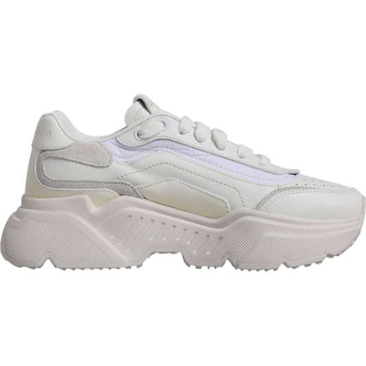 Dolce & Gabbana white Daymaster low-top sneaker with logo details, featuring a rubber sole, lace-up closure, and minor discolorations.