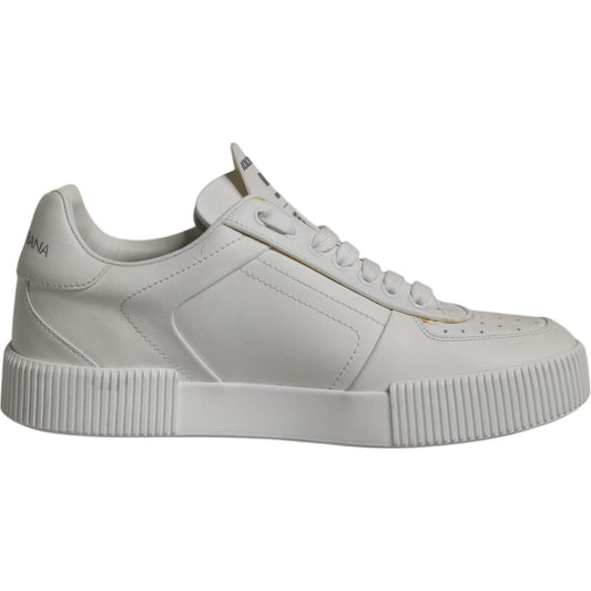 Dolce & Gabbana White Miami Leather Low Top Sneakers with lace-up closure and rubber sole. Made in Italy with minor discoloration.