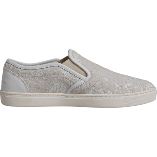 Dolce & Gabbana white floral lace slip-on loafers with rubber sole, made in Italy. Stylish and comfortable, features minor glue marks.