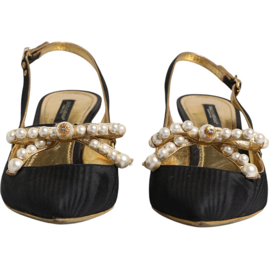 Dolce & Gabbana black leather faux pearl slingback heels with gold accents, slightly preowned, right buckle strap broken, logo details.