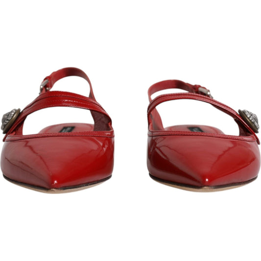 Dolce & Gabbana red leather slingback flats with buckle closure, front view. High-quality, Italian-made, logo detail on strap.