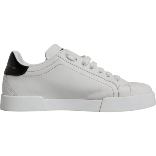 Dolce & Gabbana white leather low top sneakers with rubber sole, black heel detail. High quality, 100% calf leather, lace-up closure.