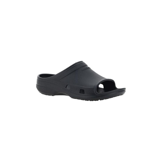 Black Balenciaga Eva Sandals with unique rubber design, open toe, and embossed logo on strap.