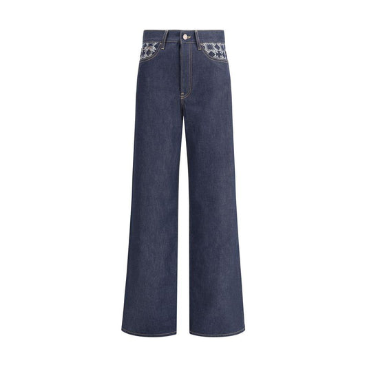 Amiri wide leg jeans with five-pocket style, front zipper, embossed logo, and palazzo cut for modern comfort and style.
