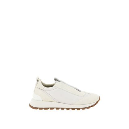 Brunello Cucinelli White Rubber Low Top Sneakers with jewels and suede detail, slip-on design, knurled sole, embossed monogram heel.