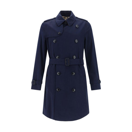 Burberry Kensington Coat in navy blue with classic collar, double-breasted button closure, removable waistband, welt pockets, and back slit.