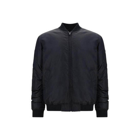 Moschino bomber jacket with front zipper, ribbed neck and cuffs, quilted design, zipper pocket on sleeve, contrasting print on back.