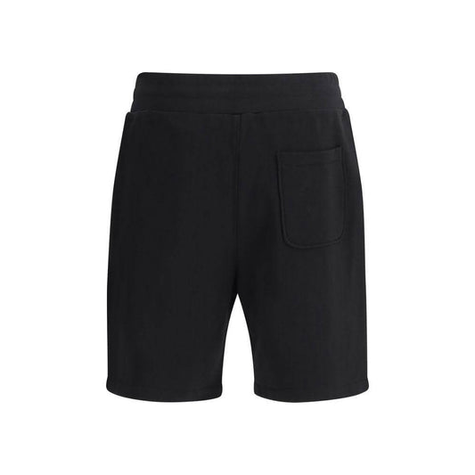 Moschino black cotton sweatpants shorts with elastic waistband, knee length, featuring iconic monogram and Teddy Bear logo for casual style.