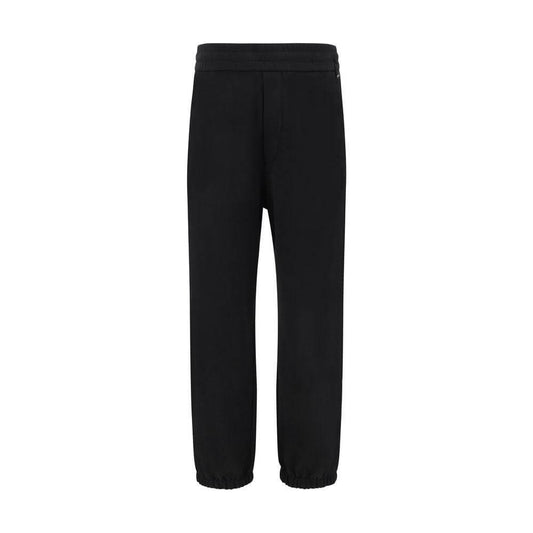 Black Fendi sweatpants with elastic waistband and hems, featuring iconic logo on back, perfect for casual urban style.
