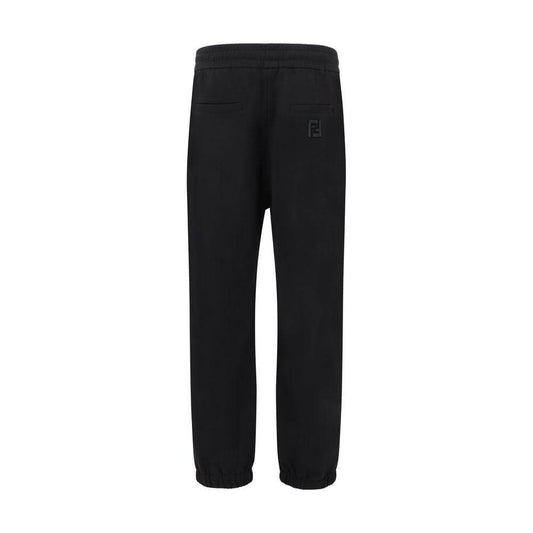Fendi black sweatpants with elastic waistband, elasticized hems, back welt pockets, and iconic logo for a modern urban style.