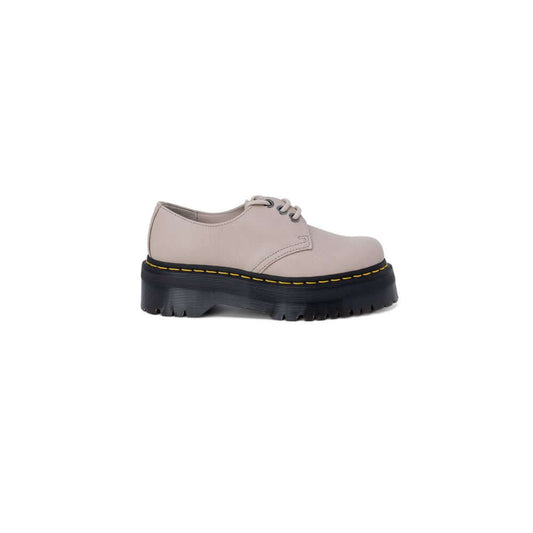 Cream leather lace-up sneaker with black platform sole, women's Dr. Martens Autumn/Winter collection