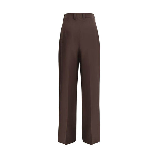 Petar Petrov high-waisted silk pants with wide-leg design, featuring hidden zipper, hook closure, and side welt pockets for elegance and comfort.