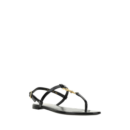 Saint Laurent Black Calf Leather Bos Taurus Flat Sandals with ankle strap and iconic monogram detail, elegant design, AW25 collection.