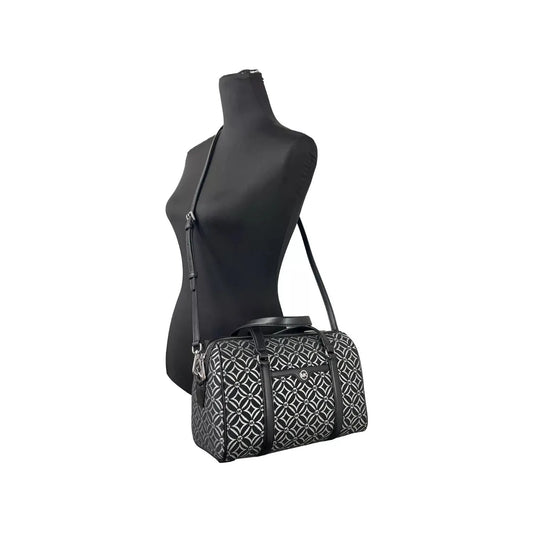 Michael Kors Medium Duffle Crossbody Bag with geometric print on mannequin, leather material, detachable strap, black color, sleek design