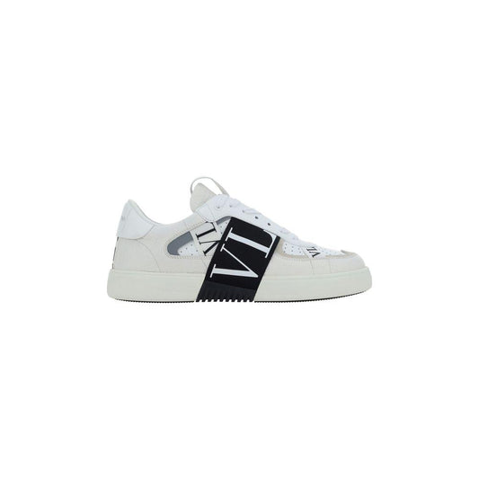 Valentino Garavani VL7N calfskin sneakers with monogram bands, perforated toe, and embroidered logo on side view.