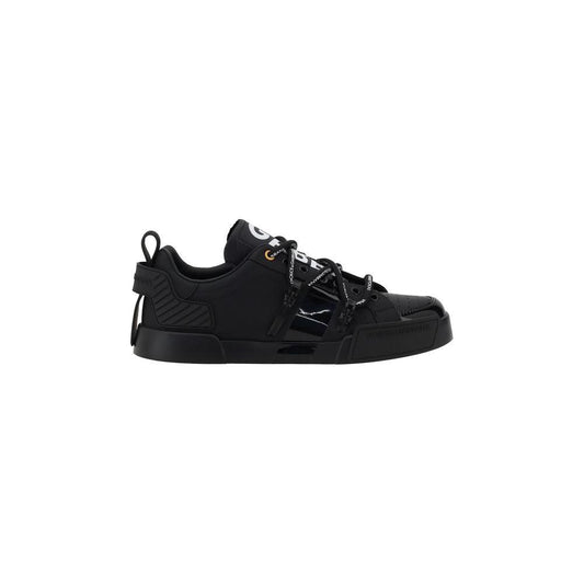 Dolce & Gabbana Portofino black sneakers with monogram detail, patent leather finish, and comfortable woven laces.