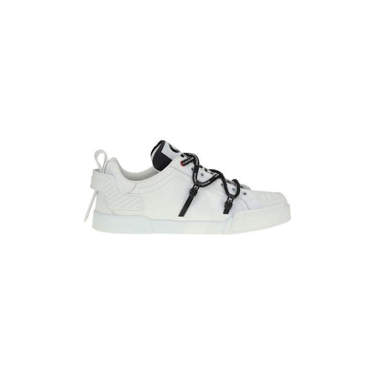 Dolce & Gabbana Portofino Sneakers in white patent leather with perforated toe, woven laces, and logoed sole.