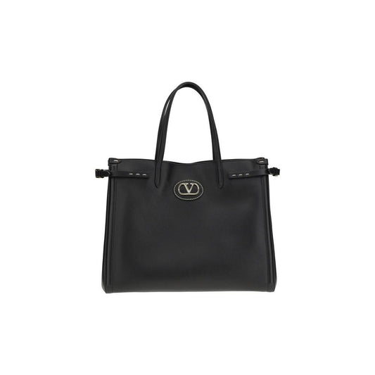 Valentino Garavani Antibes Handbag with gold-finish metallic logo, side buckles, and magnetic closure, offering luxury and sophistication.