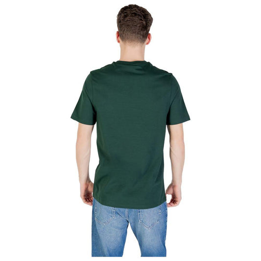 Back view of a man wearing a Lyle & Scott green cotton T-shirt with short sleeves, showcasing a casual style.