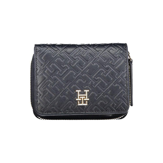 Tommy Hilfiger blue polyethylene wallet with logo, coin purse, double card spaces, contrasting details, zip and automatic closure.
