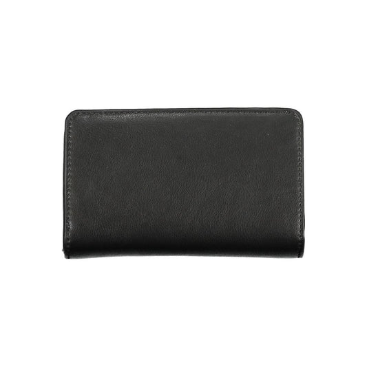 Calvin Klein black polyester wallet with one compartment, card spaces, coin purse, RFID block, snap and zip closure, logo displayed.
