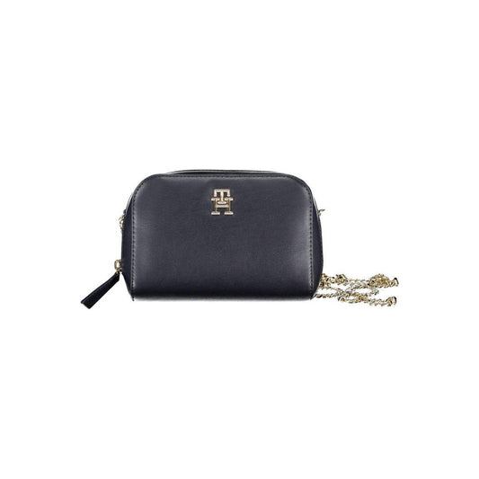 Tommy Hilfiger blue polyethylene handbag with chain shoulder straps, external and internal pockets, zip closure, and logo detail.