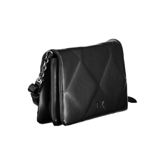 Calvin Klein black polyester handbag with adjustable strap, two compartments, internal pocket, and logo detail.