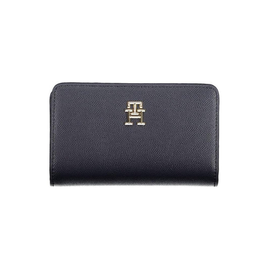 Tommy Hilfiger black women’s wallet with logo, featuring multiple compartments and durable design.