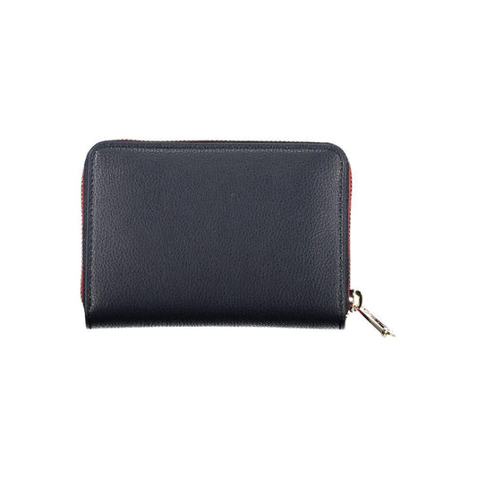Tommy Hilfiger sleek blue wallet with zip closure, featuring ample compartments and eco-friendly recycled polyester design.