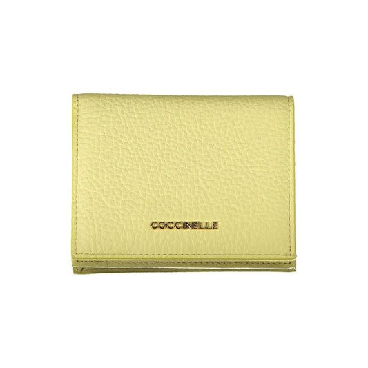 Coccinelle yellow leather wallet with compartments, coin purse, card slots, zip and automatic closure.