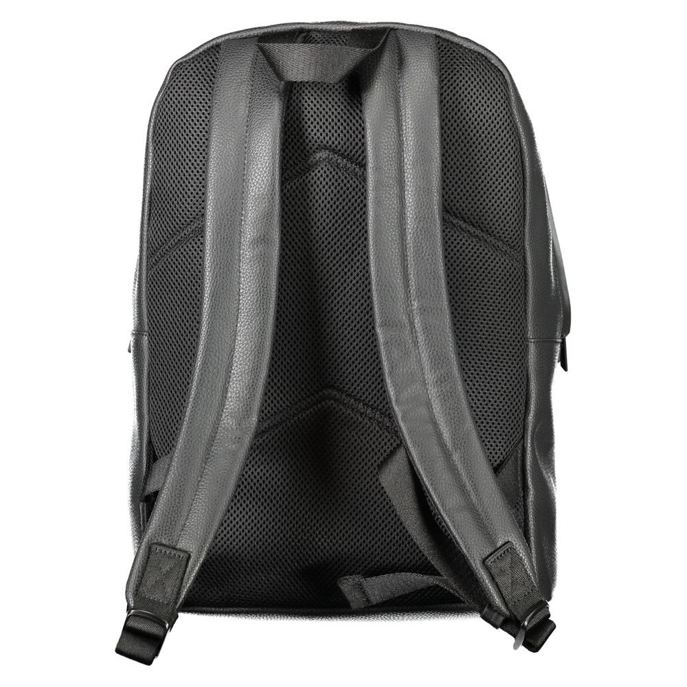 Back view of Calvin Klein Black Polyester Men Backpack with adjustable shoulder straps and ergonomic design.