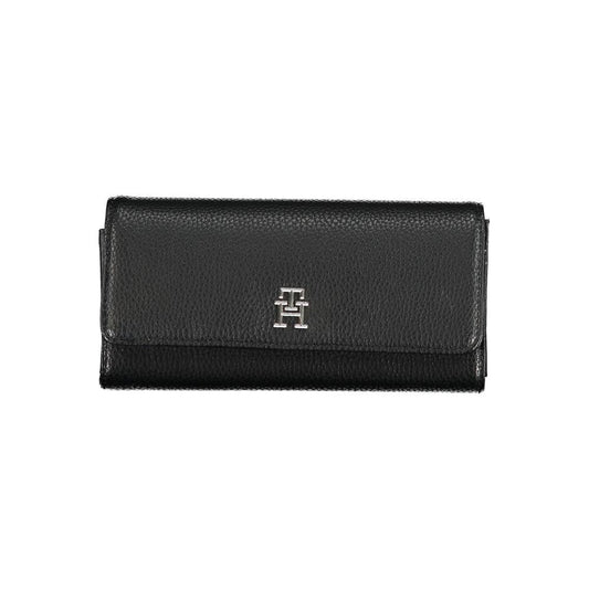 Tommy Hilfiger Elegant Quadruple Compartment Wallet with logo, featuring triple card slots and dedicated coin purse in sleek black design