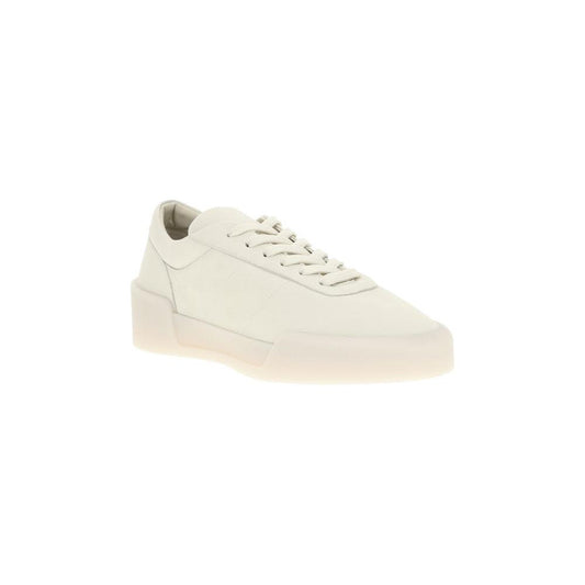 Fear of God Aerobic Low Sneakers in white leather with a minimal design, elongated toe, and contrasting rubber sole.