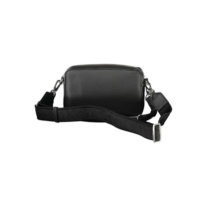 Calvin Klein Black Polyester Women Handbag with removable shoulder handle and adjustable strap for urban chic style.