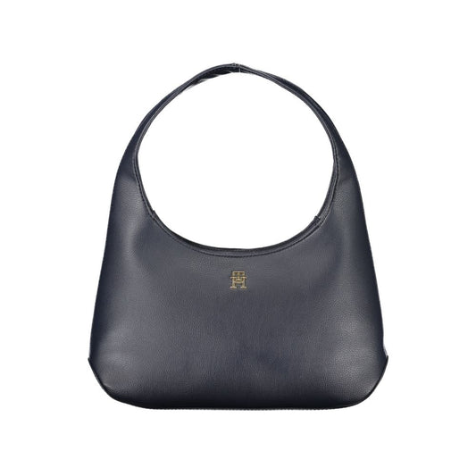 Tommy Hilfiger blue polyester handbag with a single shoulder handle, internal pocket, zip closure, and logo detail.