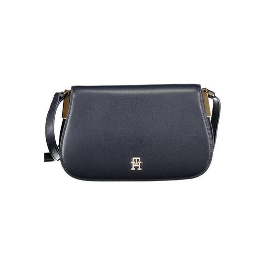 Tommy Hilfiger blue polyethylene handbag with adjustable shoulder strap, logo, and snap closure, featuring one internal pocket.