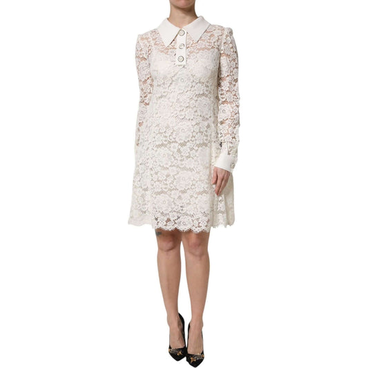 Dolce & Gabbana white floral lace shift dress with long sleeves and exclusive Italian craftsmanship shown full-length on a model.