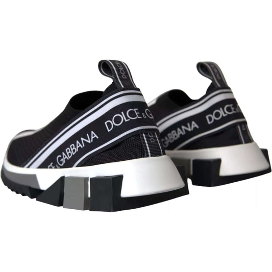 Dolce & Gabbana black and white Sorrento sneakers with logo detail and rubber sole, rear view showing pull strap.