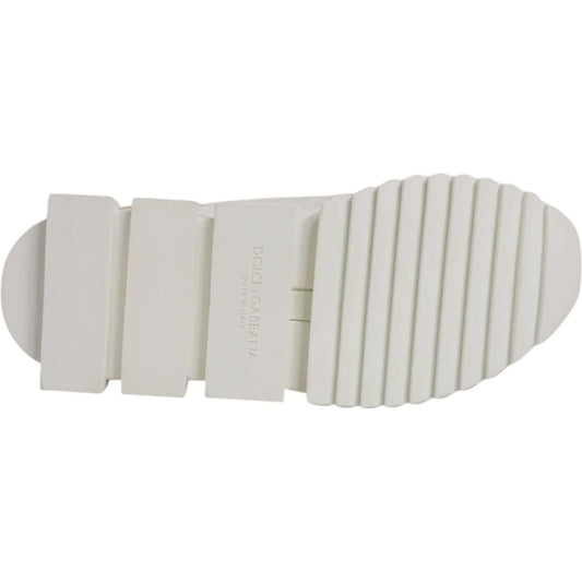 Bottom view of Dolce & Gabbana Sorrento sneakers showing white rubber cleated sole, ideal for trekking.