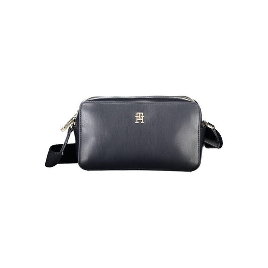 Tommy Hilfiger blue polyethylene women's handbag with logo and adjustable strap, showcasing preppy chic design and practical features.