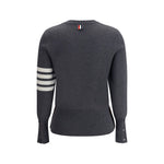 Back view of Thom Browne Virgin wool Sweater featuring ribbed high hem and signature horizontal bands.