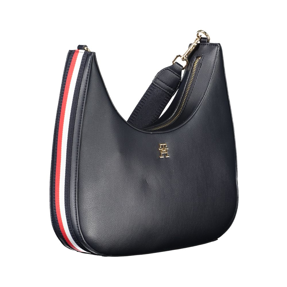 Front view with bag zipped and handles upright.