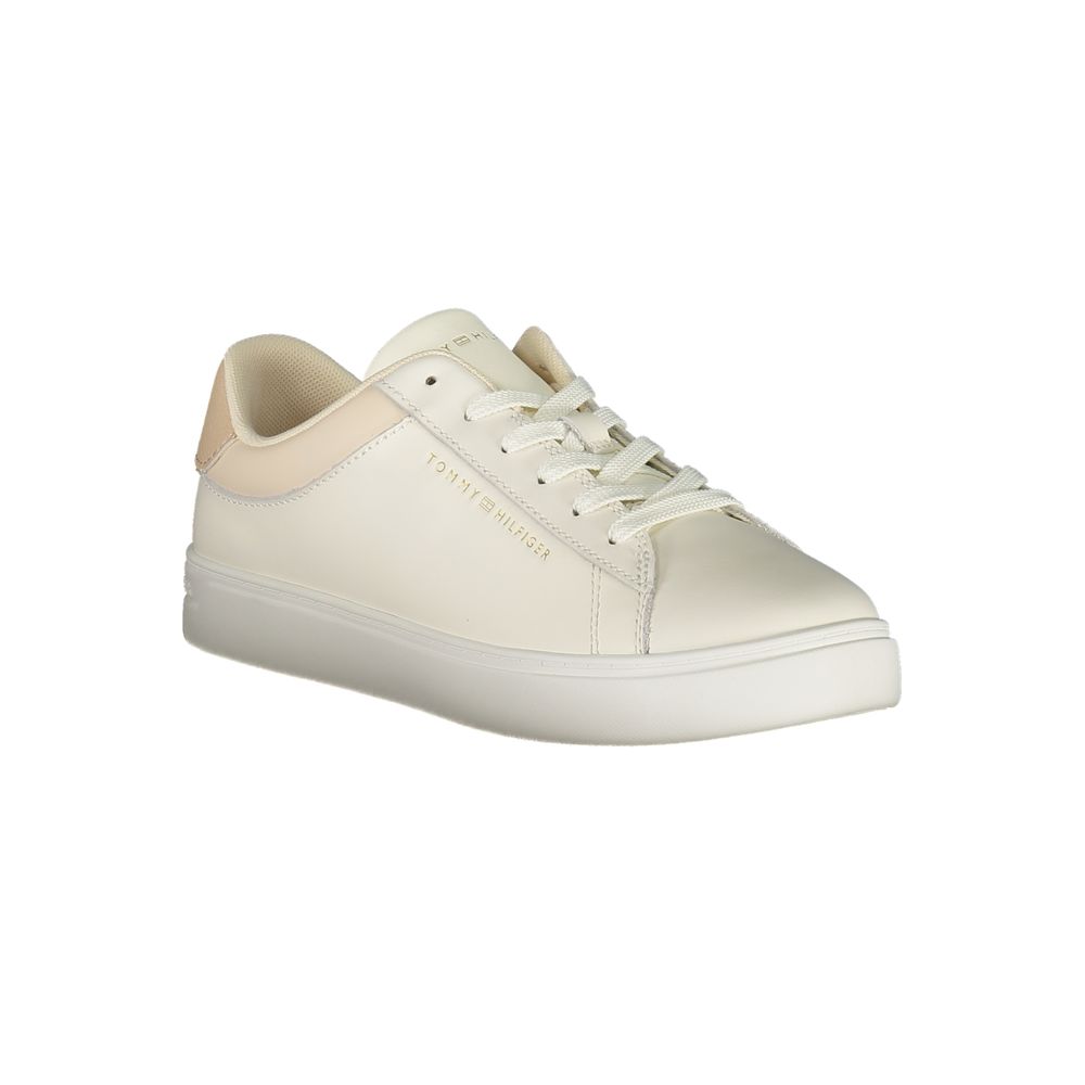 Tommy Hilfiger Beige Leather Women Sneaker with sleek design, removable footbed, and iconic logo for high-fashion flair.