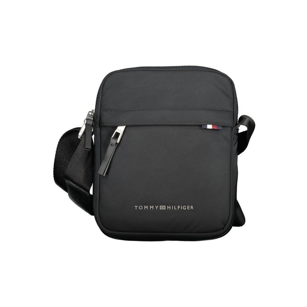 Front view with bag zipped and handles upright.