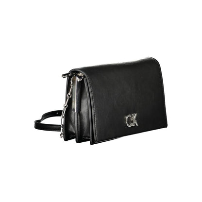 Calvin Klein Black Polyester Handbag with adjustable strap, two compartments, twist closure, and logo accent.