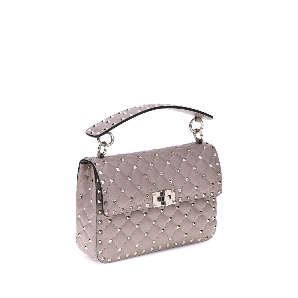 Valentino Garavani Medium Rockstud Spike Shoulder Bag in diamond-quilted leather with gold-tone studs and black leather handle.